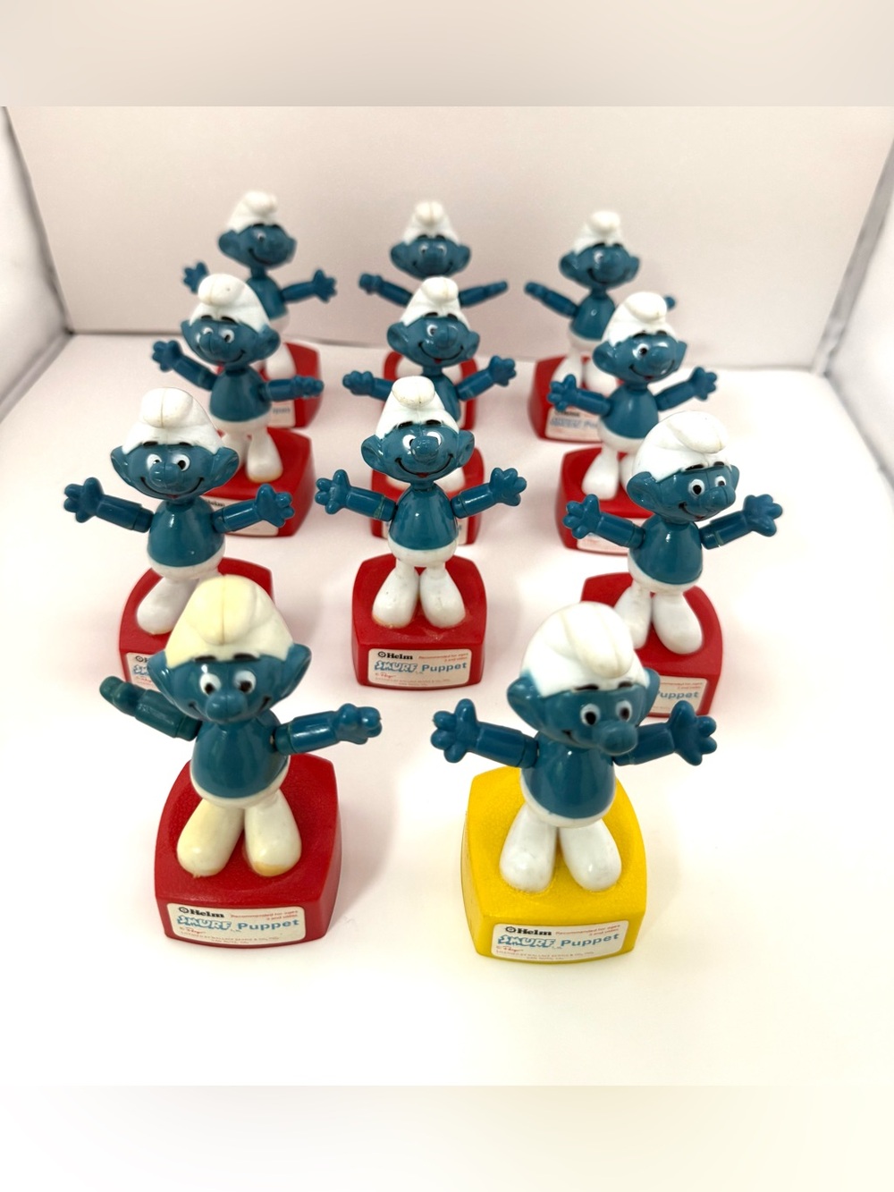 Vintage Helm Peyo Smurfs Wallace Berrie Push Puppets 1980s - 11 total.